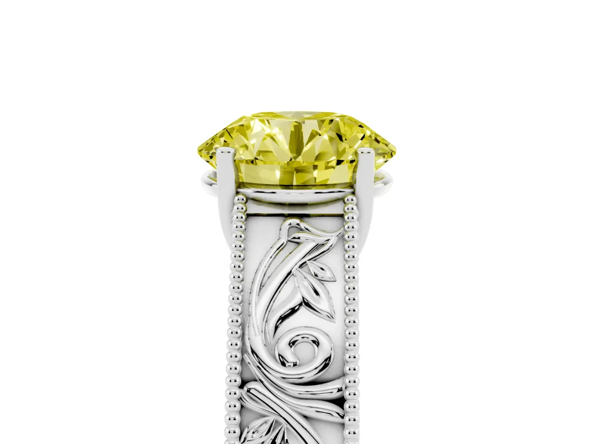 Fancy Yellow Round Cut Diamond Solitaire Ring with Engraved Band and Four-Prong Setting White gold