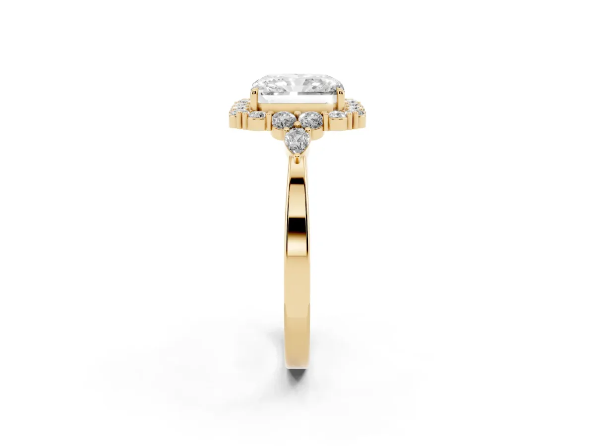 Radiant Cut Diamond Halo Ring with Pear Side Stones and Prong Setting Yellow gold