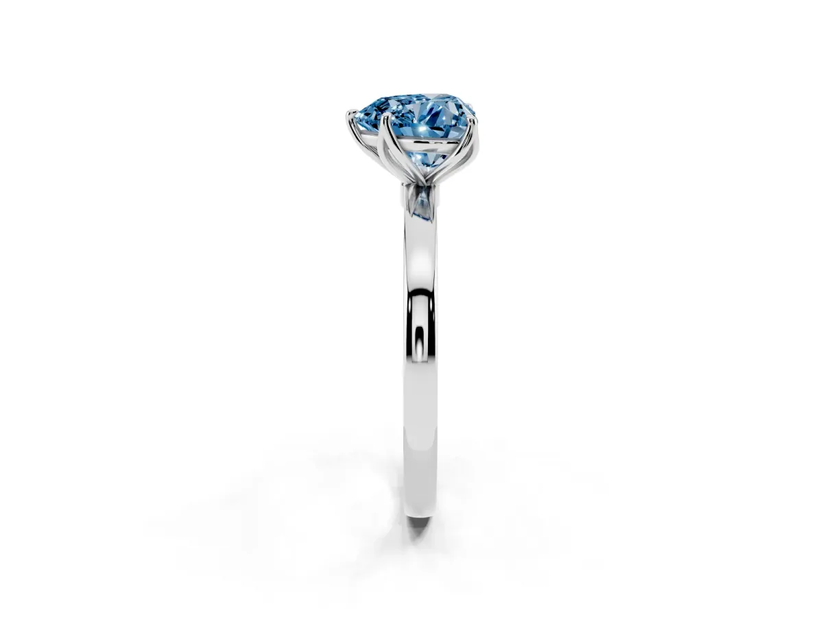 Fancy Blue Heart Cut Diamond Solitaire Ring with Thin Band and Prong Setting Silver