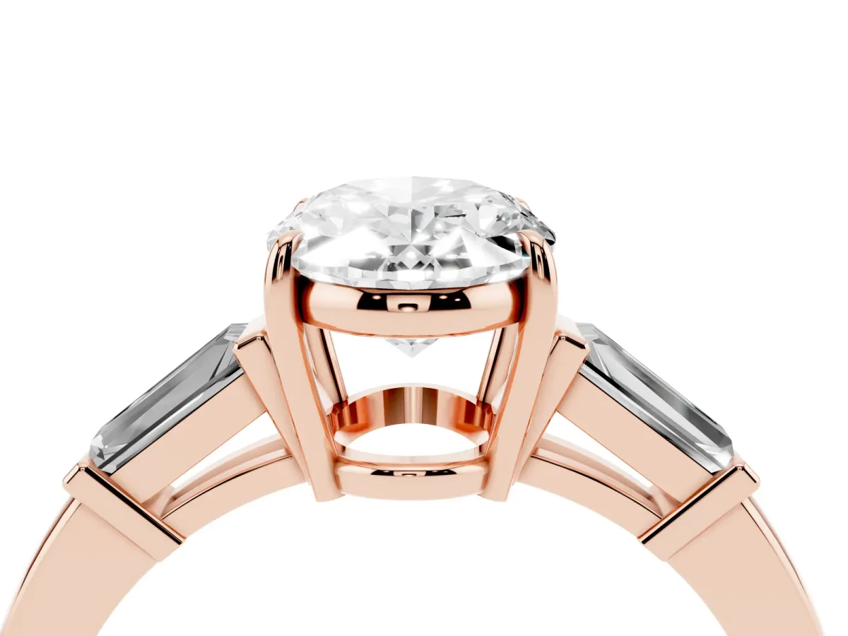 Oval Cut Diamond Three-Stone Ring with Tapered Baguette Side Stones and Prong Setting Rose gold