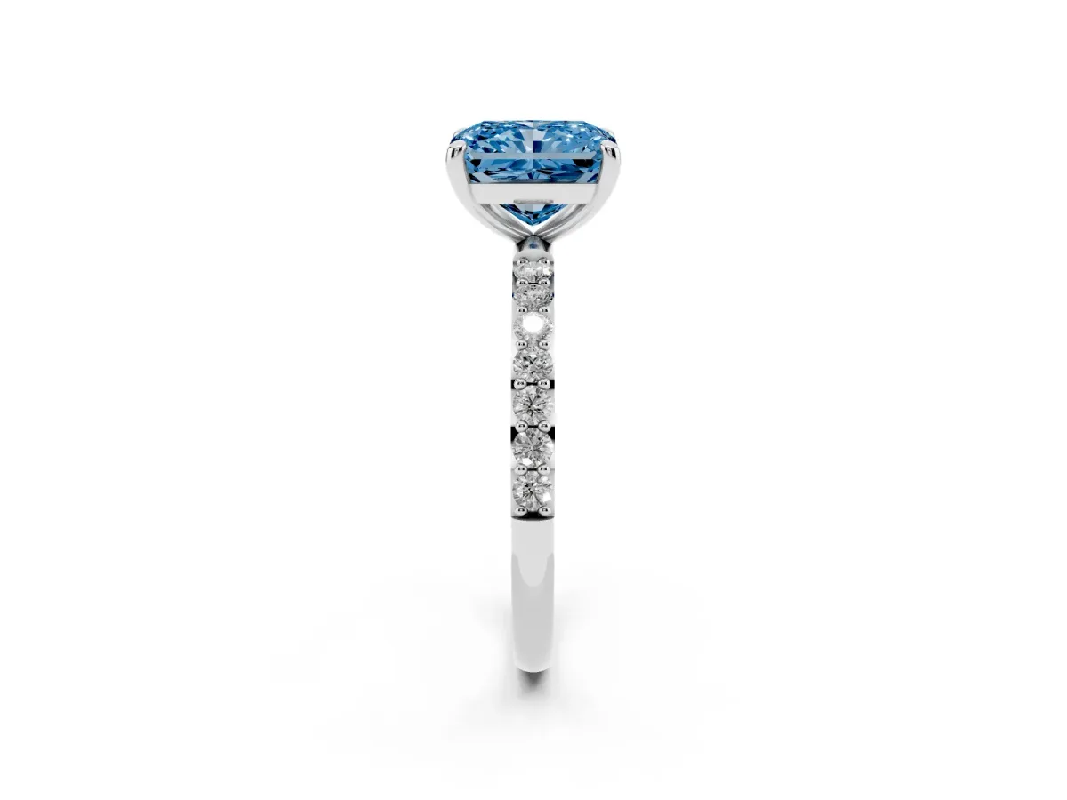 Fancy Blue Radiant Cut Diamond Solitaire Ring with Round Pavé Band and Prong Setting Silver