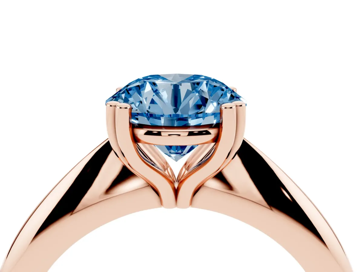Fancy Blue Round Cut Cut Solitaire Engagement Ring with Tapered Band and Four-Prong Setting Rose gold