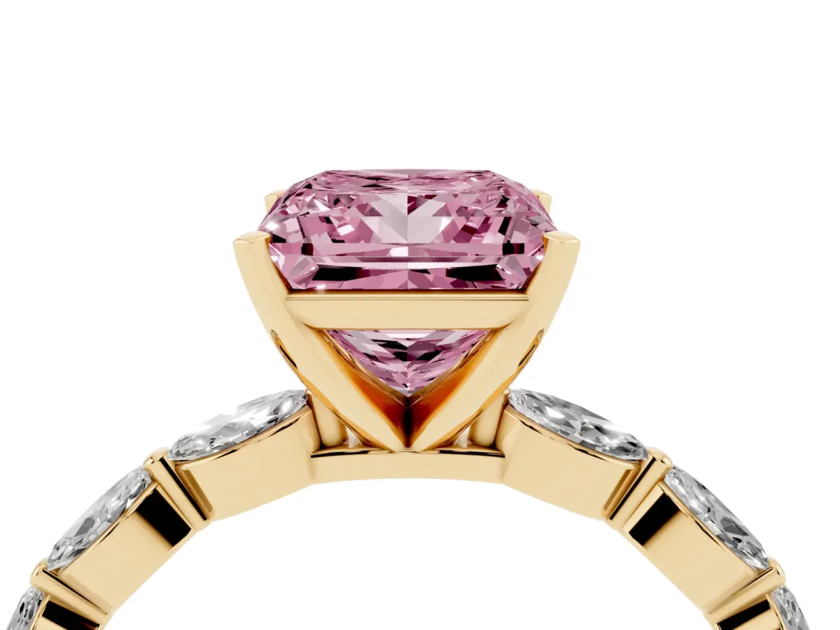Fancy Pink Princess Cut Diamond Ring with Marquise Side Stones and Prong Setting Yellow gold