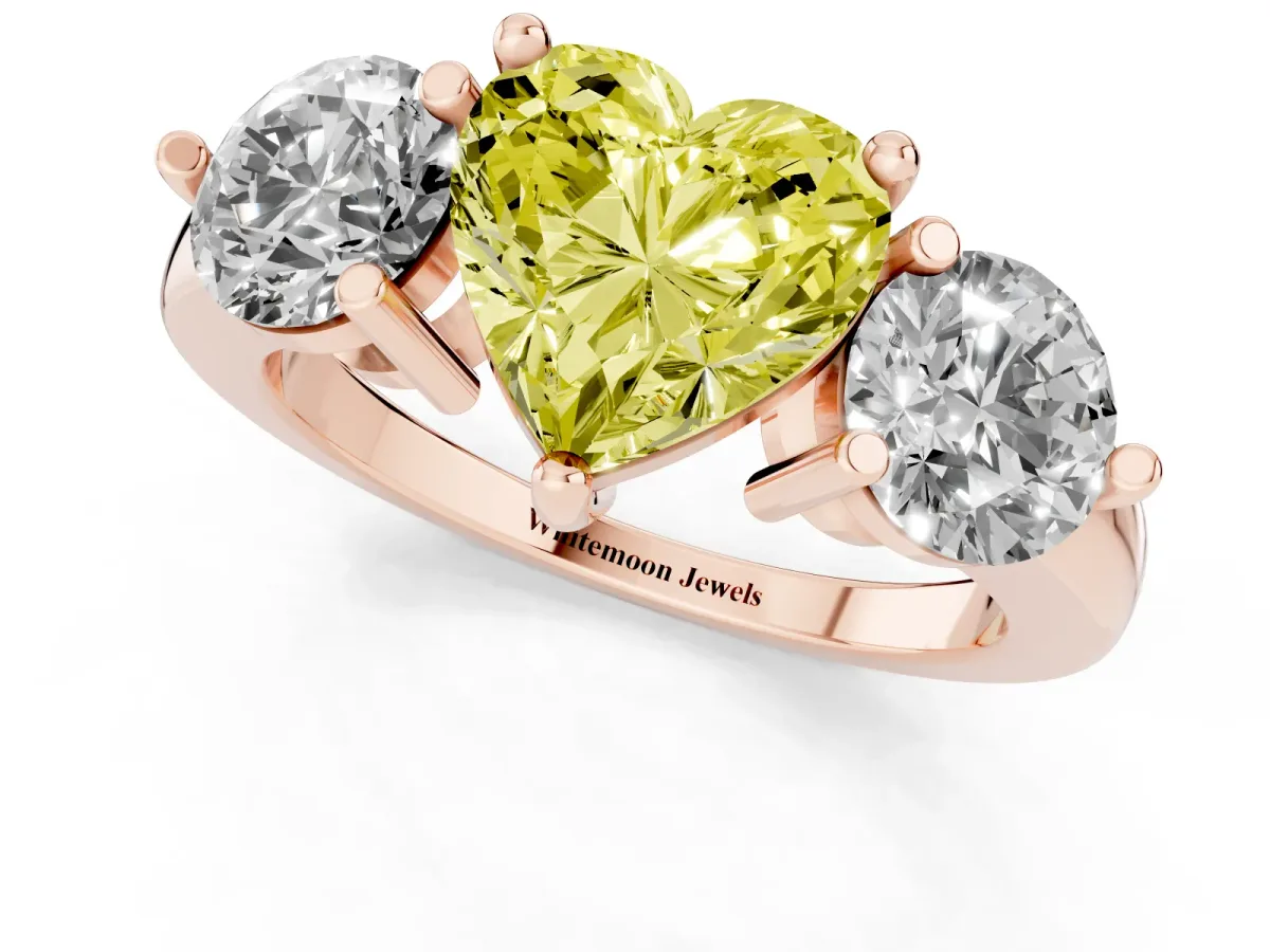 Fancy Yellow Three-Stone Heart Cut Brilliant Cut Solitaire Ring with Prong Setting on a Classic Band Rose gold