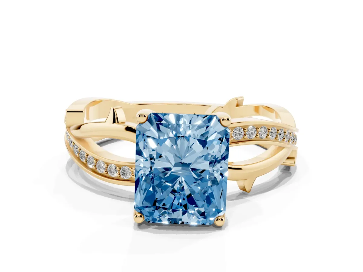 Fancy Blue Radiant Cut Solitaire Twist Band with Pavé Accents and Four-Prong Setting Yellow gold