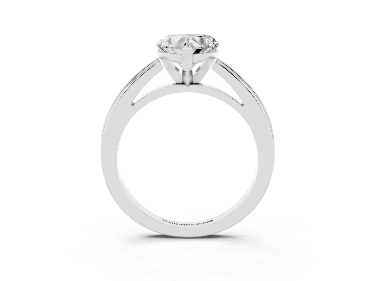 Heart Cut Solitaire Diamond Ring with Four-Prong Setting and Classic Band Silver