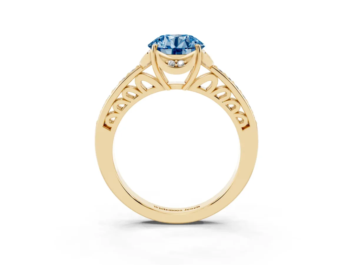 Fancy Blue Round Cut Cut Halo Diamond Ring with Channel Set Band and Four-Prong Setting Yellow gold