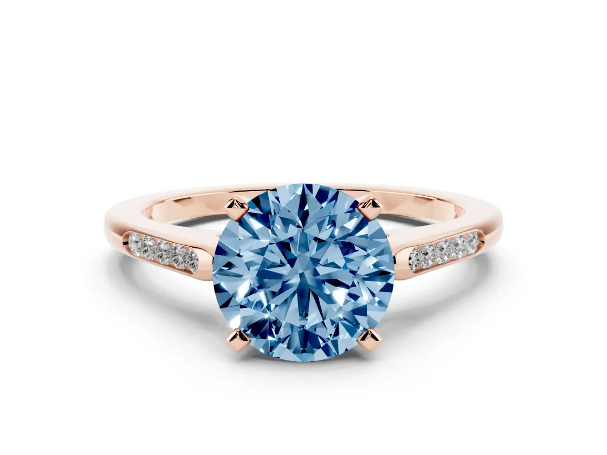 Fancy Blue Round Cut Diamond Solitaire Ring with Channel Set Round Band and Prong Setting Rose gold