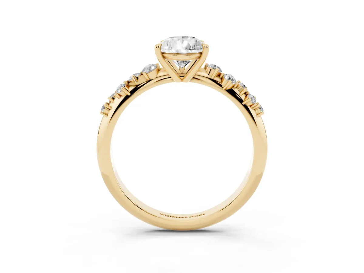 Pear Cut Diamond Cluster Side Stone Solitaire Ring with Prong Setting Yellow gold