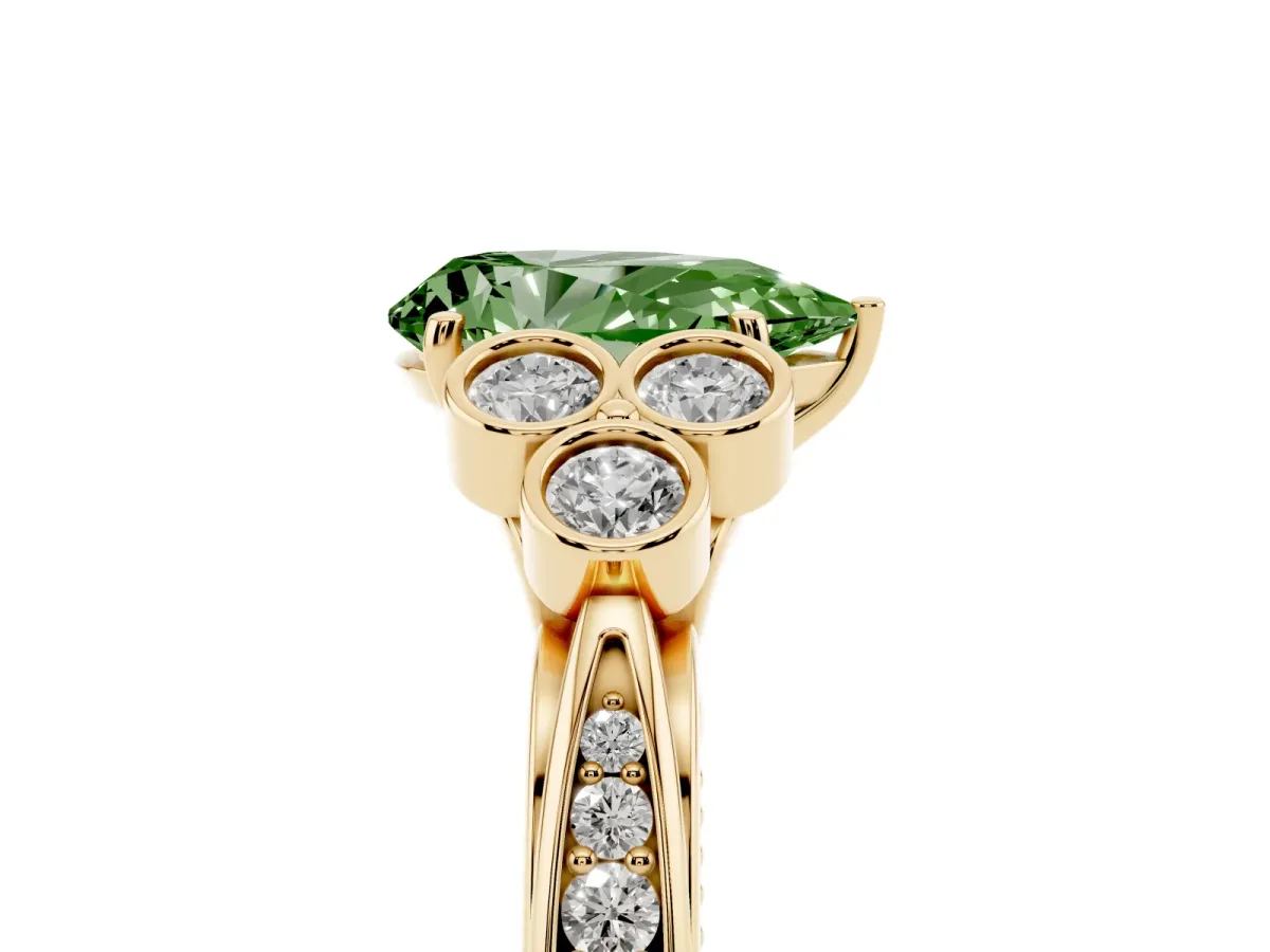 Fancy Green Pear Cut Cut Diamond Engagement Ring with Bezel Set Round Side Stones and Prong Setting Yellow gold