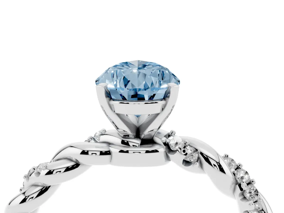 Fancy Blue Pear Cut Diamond Solitaire Ring with Twisted Band and Pavé Accents Silver