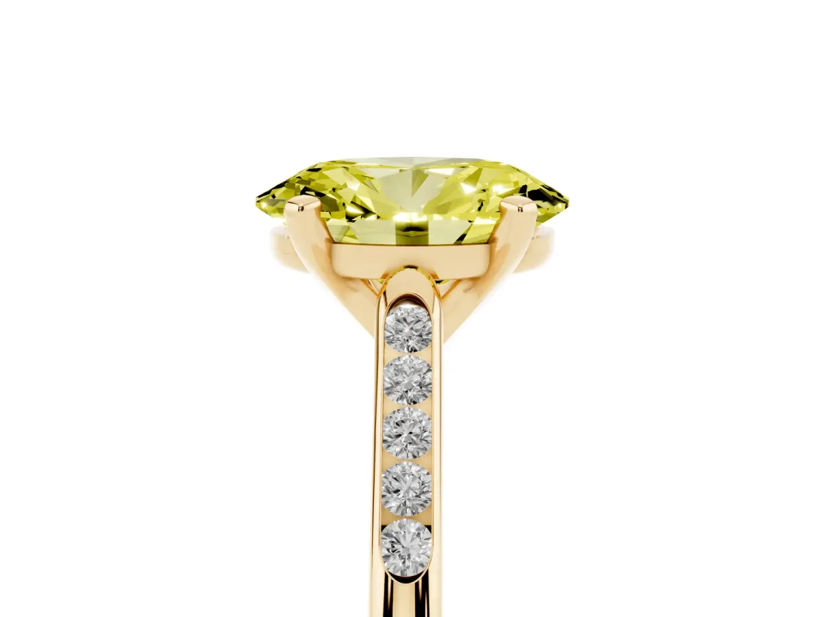Fancy Yellow Oval Cut Diamond Solitaire Ring with Channel Set Round Band and Prong Setting Yellow gold