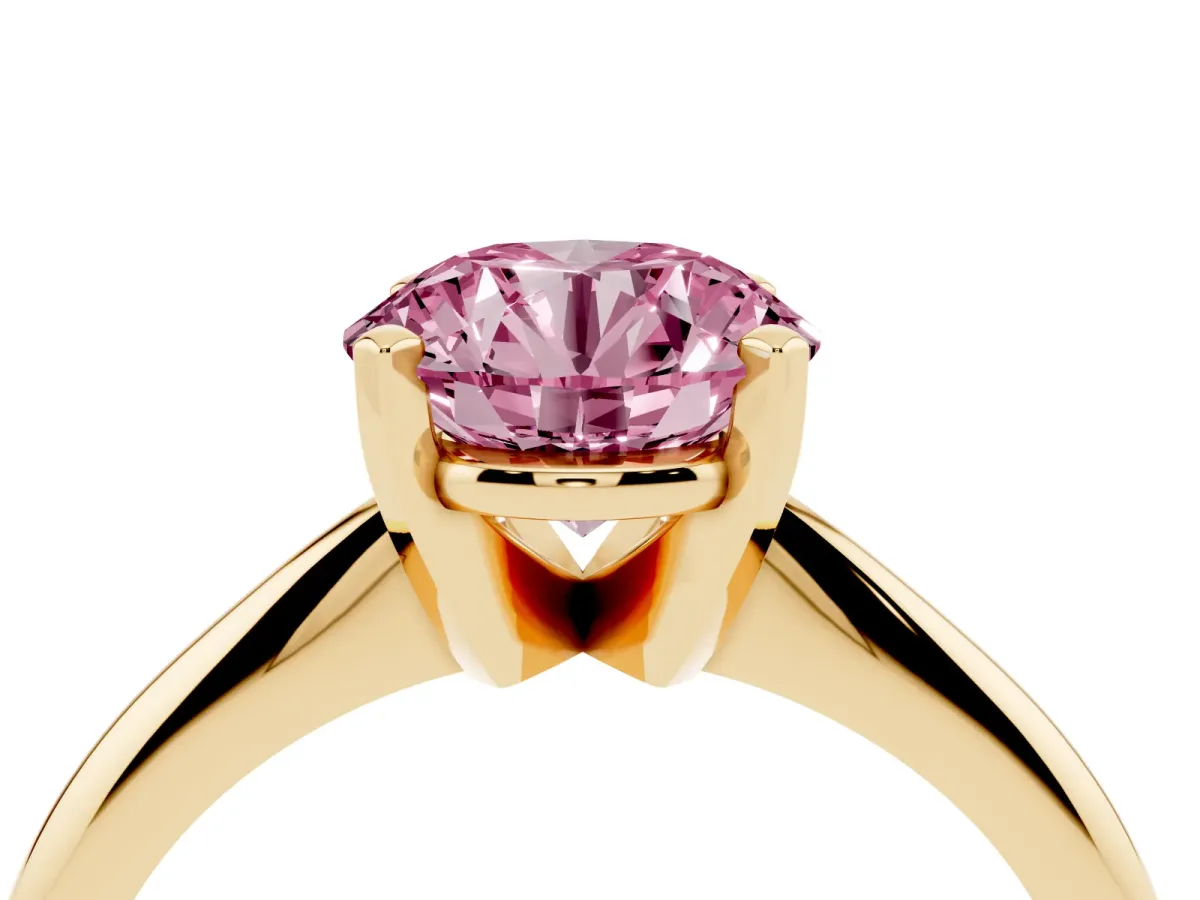 Fancy Pink Round Cut Cut Solitaire Ring with Four-Prong Setting on a Classic Band Yellow gold