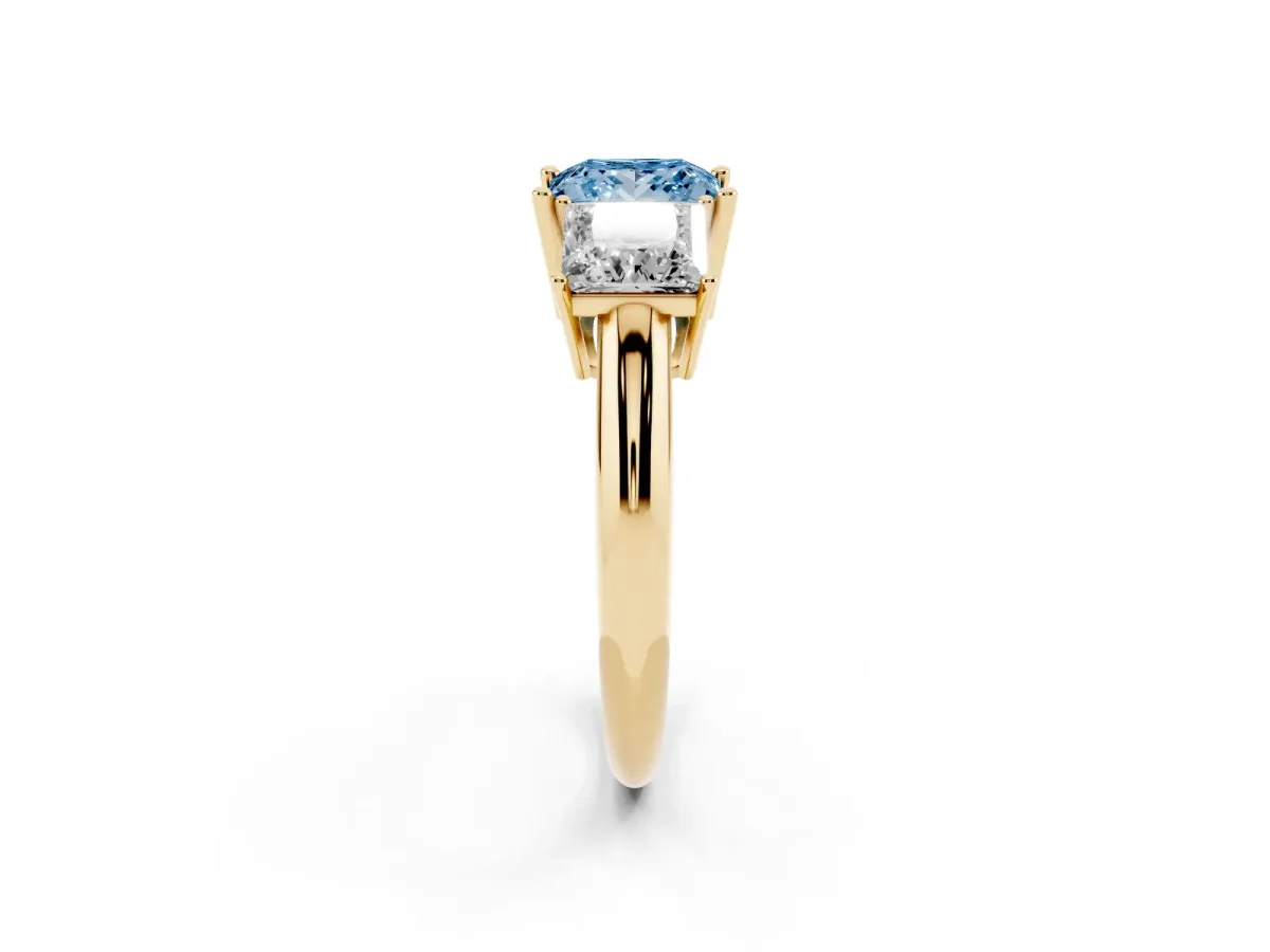 Fancy Blue Three-Stone Princess Cut Cut Diamond Engagement Ring with Prong Setting on a White Gold Band Yellow gold