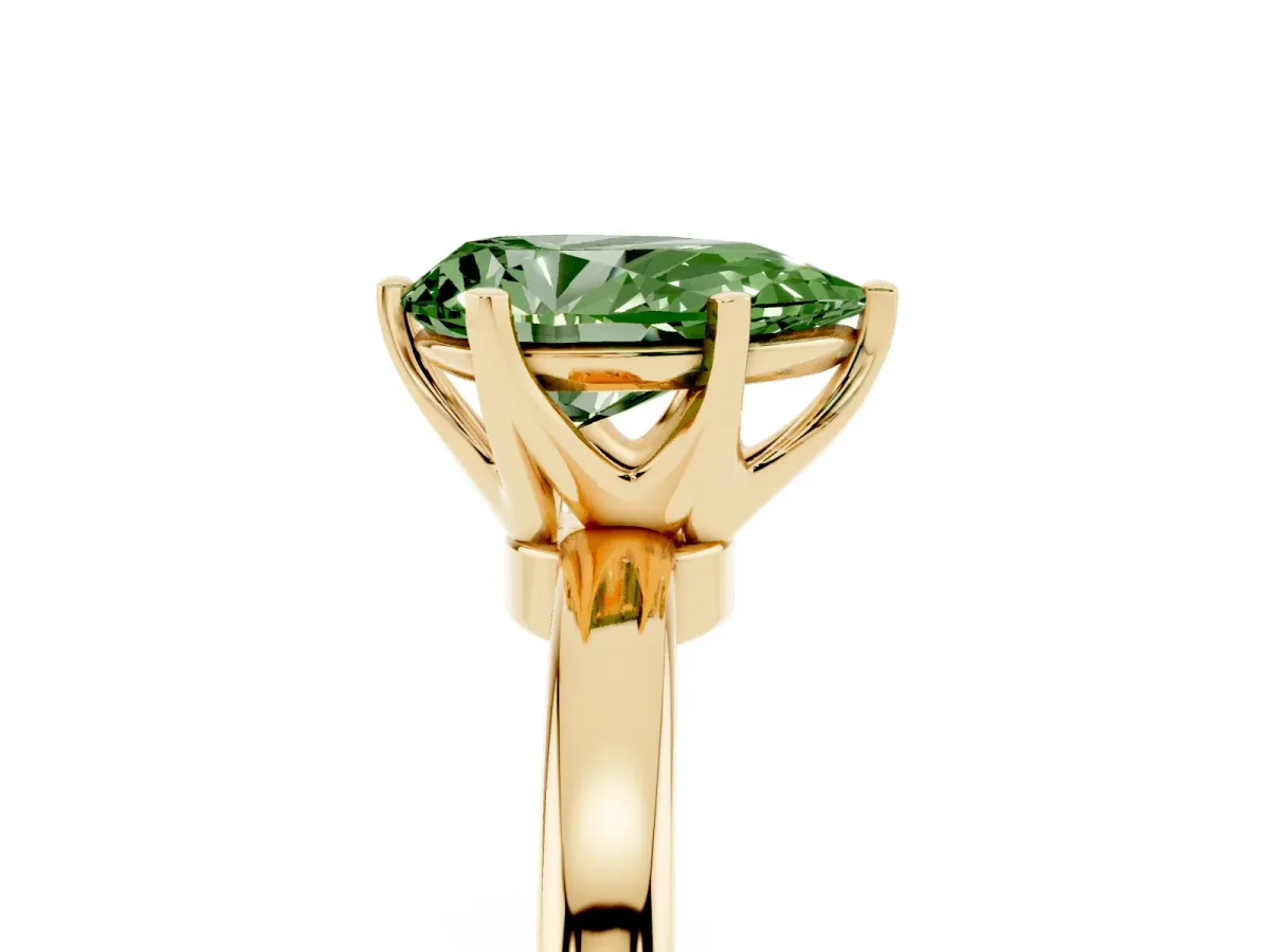 Fancy Green Pear Cut Solitaire Diamond Ring with Six-Prong Setting on a Classic Band Yellow gold