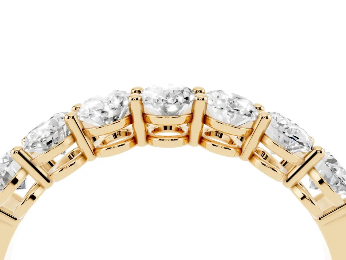 Oval Diamond Shared Prong Eternity Band Yellow gold
