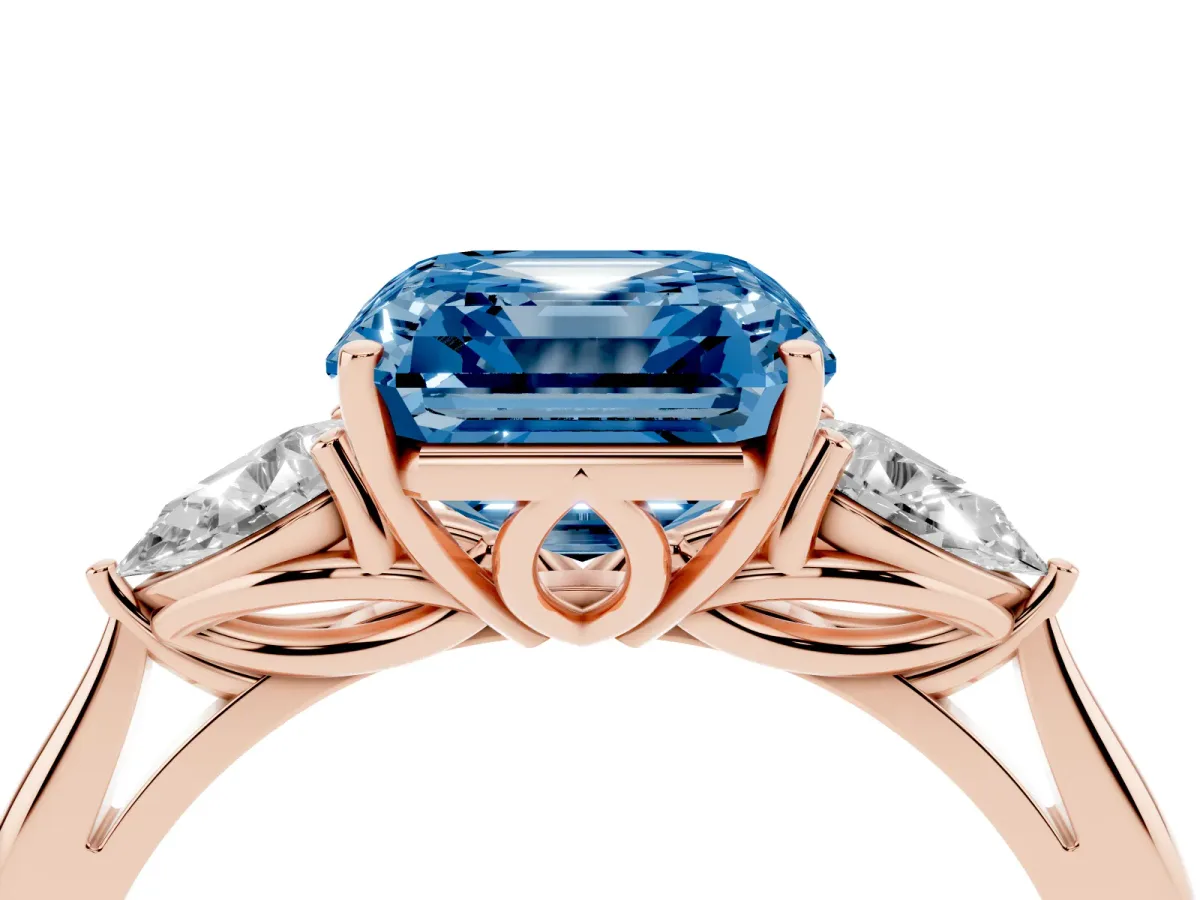 Fancy Blue Three-Stone Asscher Cut Brilliant Diamond Solitaire Ring with Tapered Band and Four-Prong Setting Rose gold