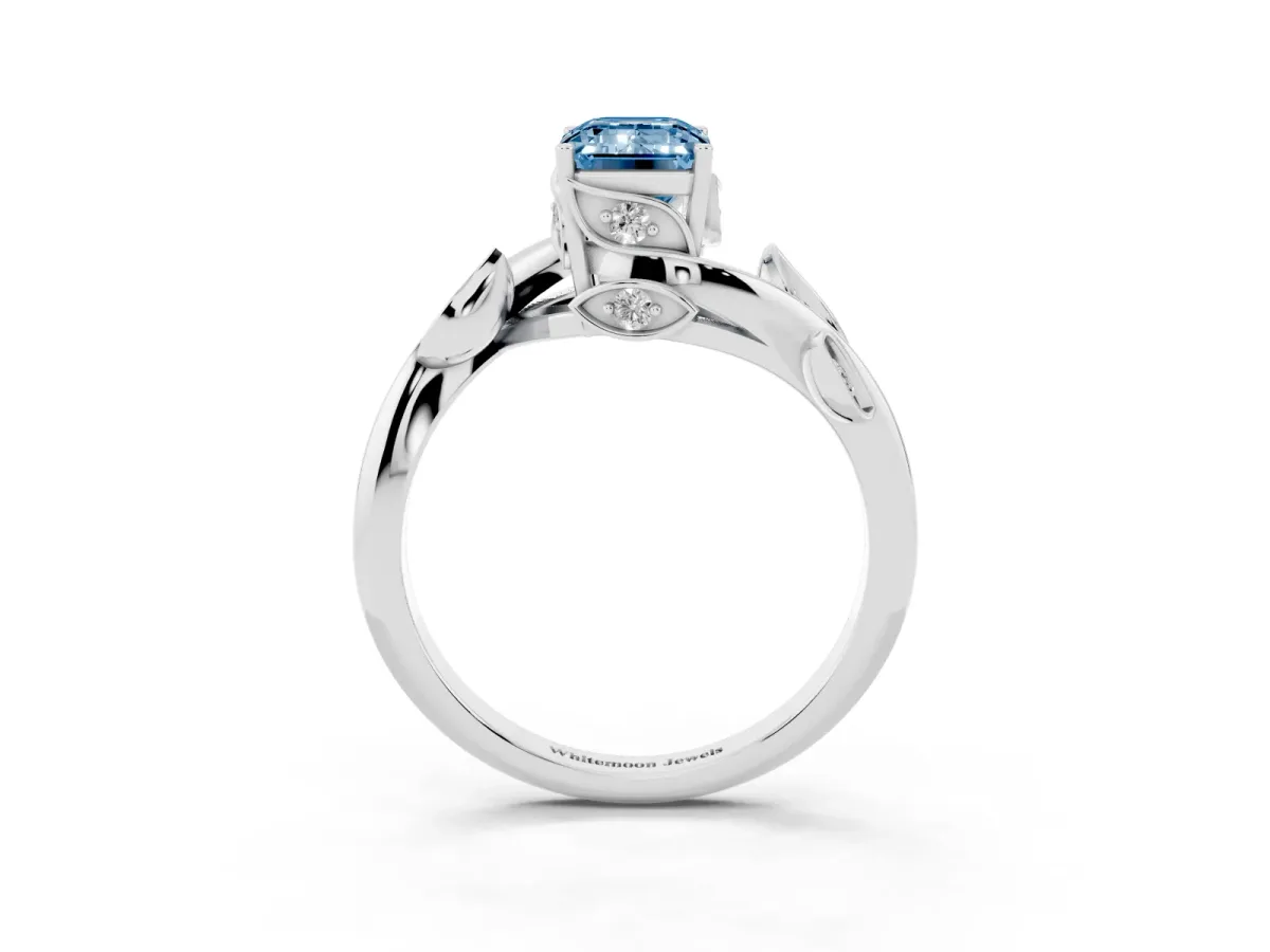 Fancy Blue Emerald Cut Solitaire Twist Engagement Ring with Leaf Accents and Prong Setting Silver