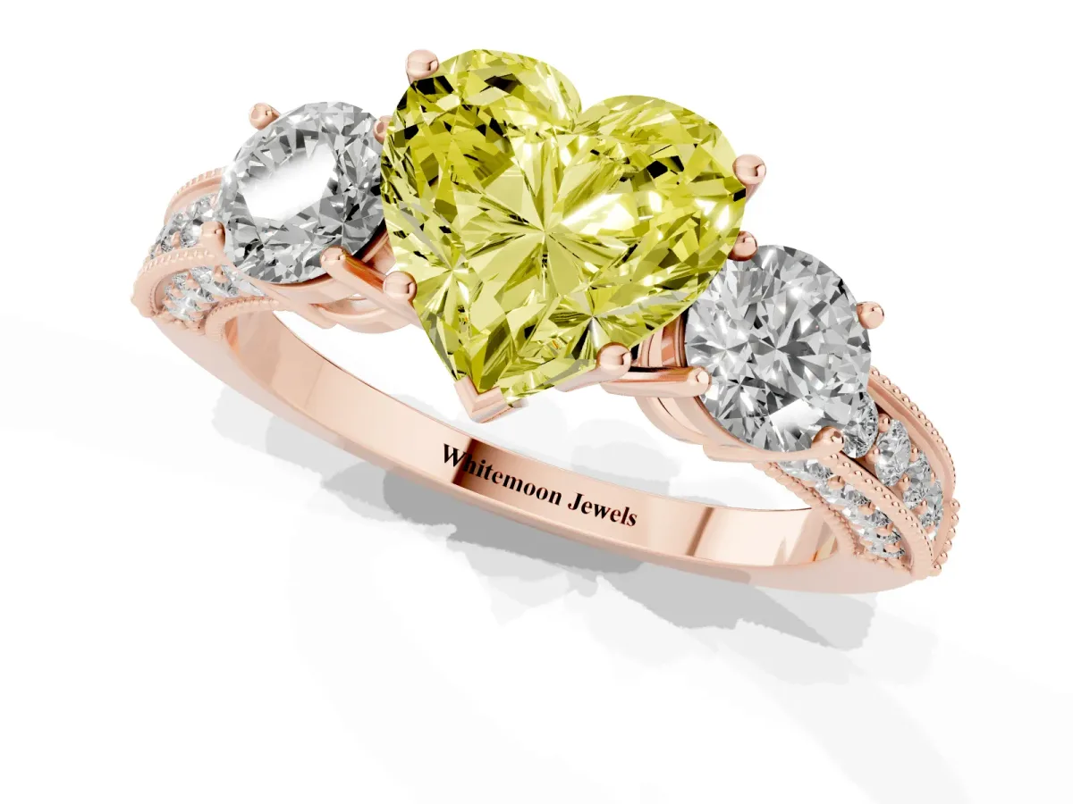Fancy Yellow Heart Cut Three-Stone Diamond Ring with Pavé Band and Four-Prong Setting Rose gold