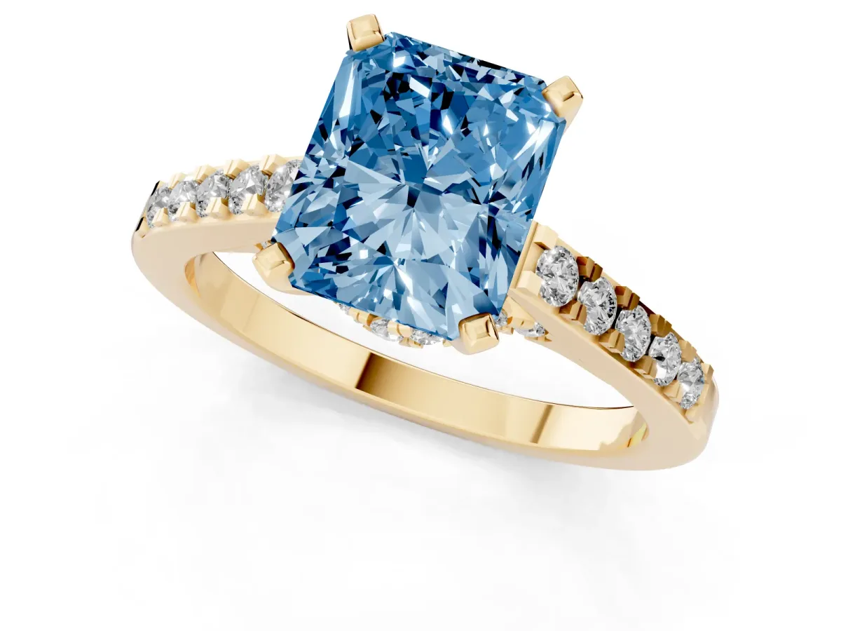 Fancy Blue Radiant Cut Diamond Solitaire Ring with Crossover Gallery and Round Pavé Band Yellow gold