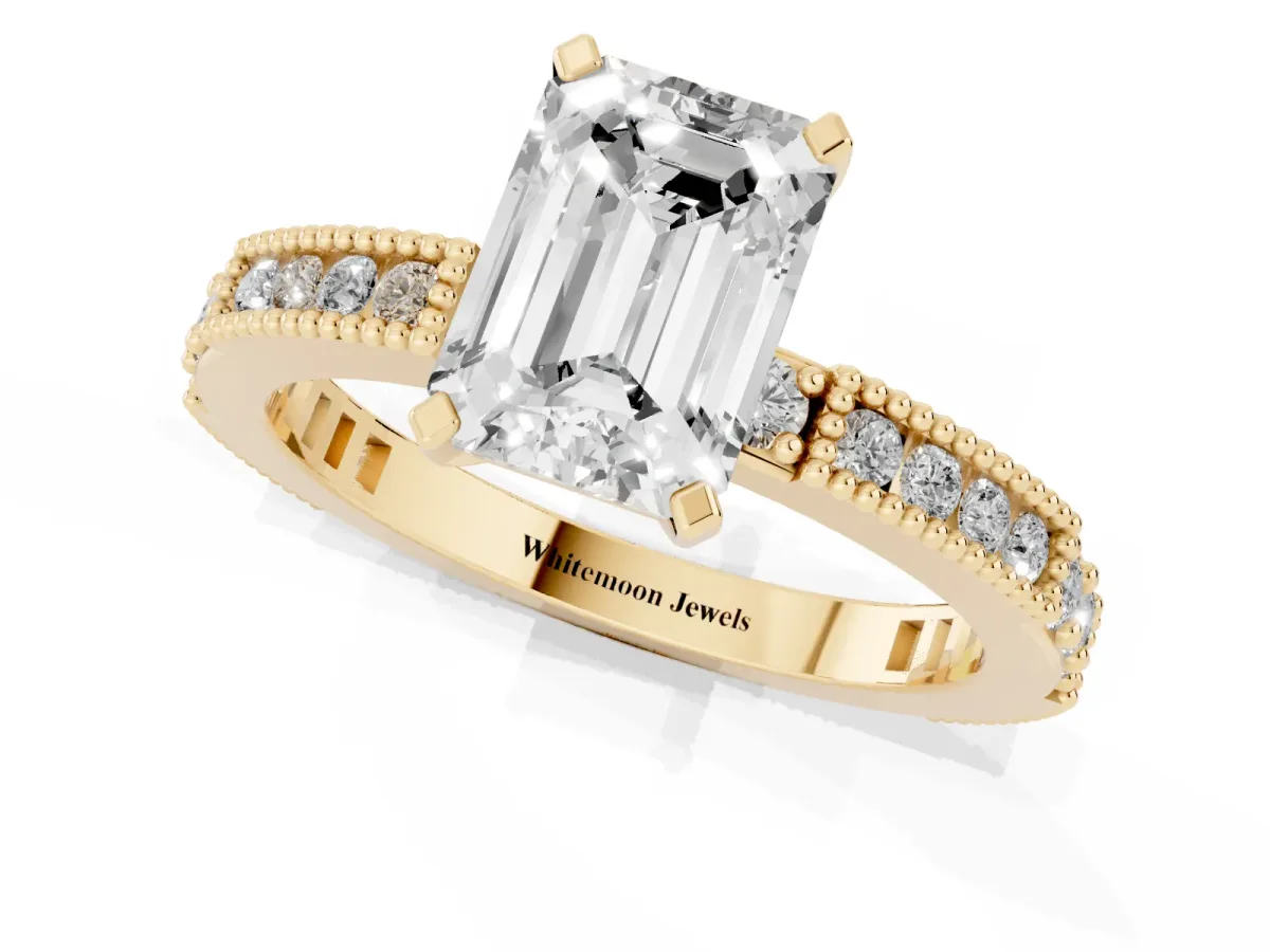 Emerald Cut Solitaire with Pavé Band and Four-Prong Setting Yellow gold