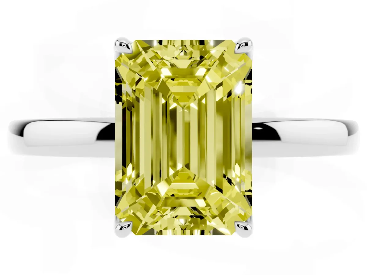 Fancy Yellow Emerald Cut Diamond Solitaire Ring with Thin Band and Prong Setting Silver