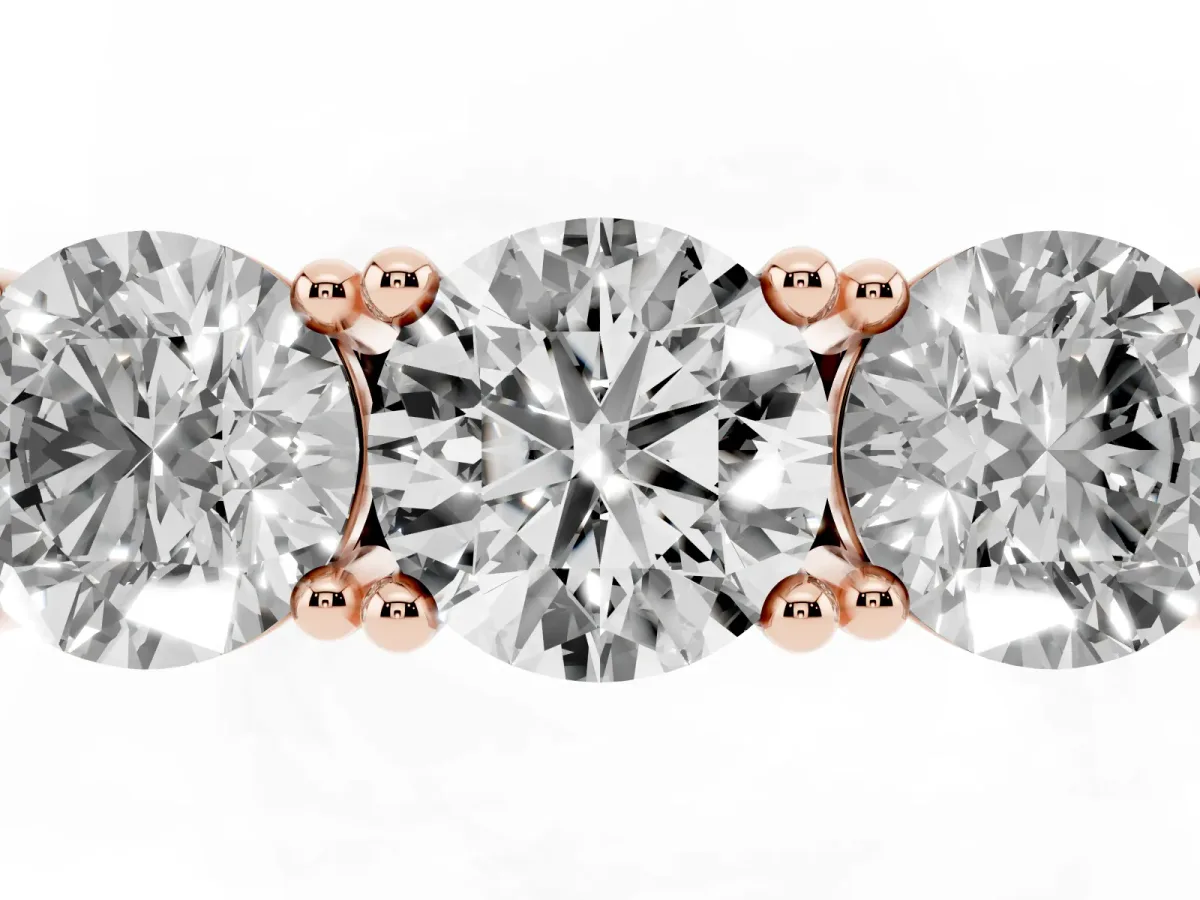 Three-Stone Round Cut Diamond Channel Band with Prong Setting Rose gold