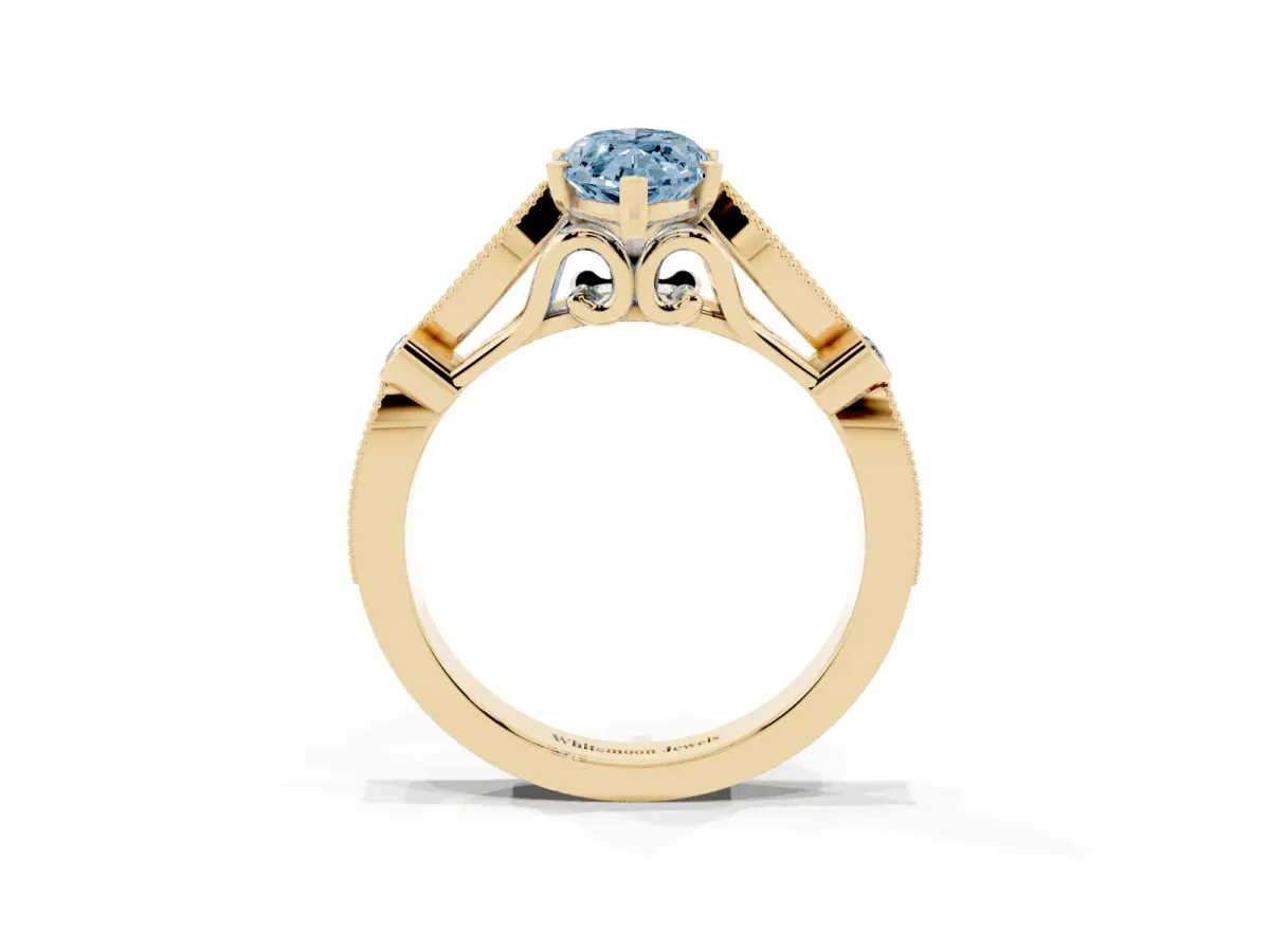 Fancy Blue Marquise Cut Cut Diamond with Milgrain Marquise and Bezel Accents on a Solitaire Band with Prong Setting Yellow gold