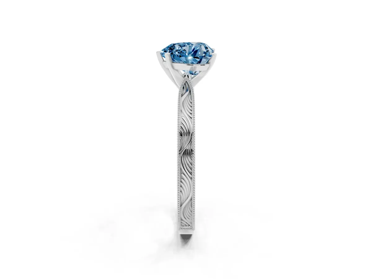Fancy Blue Heart Cut Solitaire Milgrain Engraved Band with Four-Prong Setting Platinum
