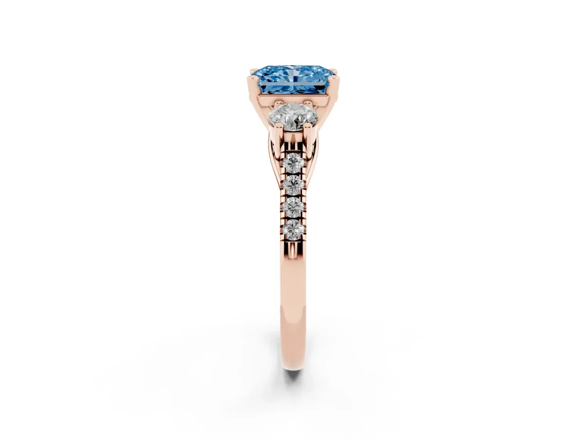 Fancy Blue Three-Stone Radiant Cut Diamond Pavé Band with Four-Prong Setting Rose gold