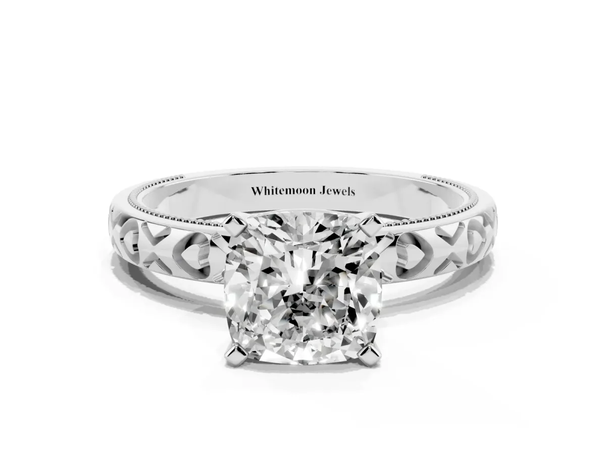 Cushion Cut Solitaire Diamond Engagement Ring with XO Engraved Band and Four-Prong Setting Platinum