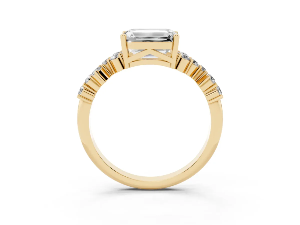 Emerald Cut Diamond Scattered Round Accent Ring with Prong Setting Yellow gold
