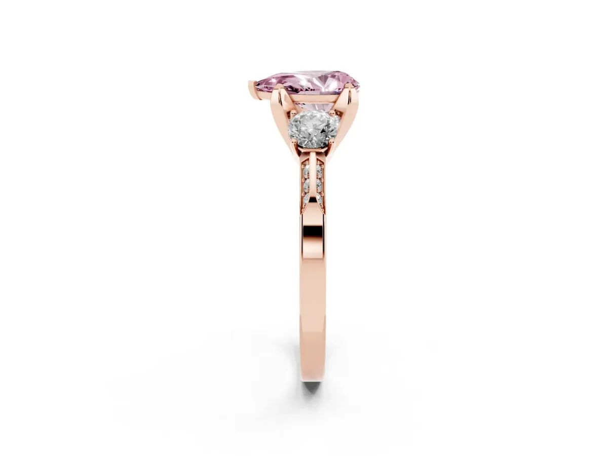 Fancy Pink Pear Cut Brilliant Three-Stone Diamond Ring with Pavé Band and Four-Prong Setting Rose gold