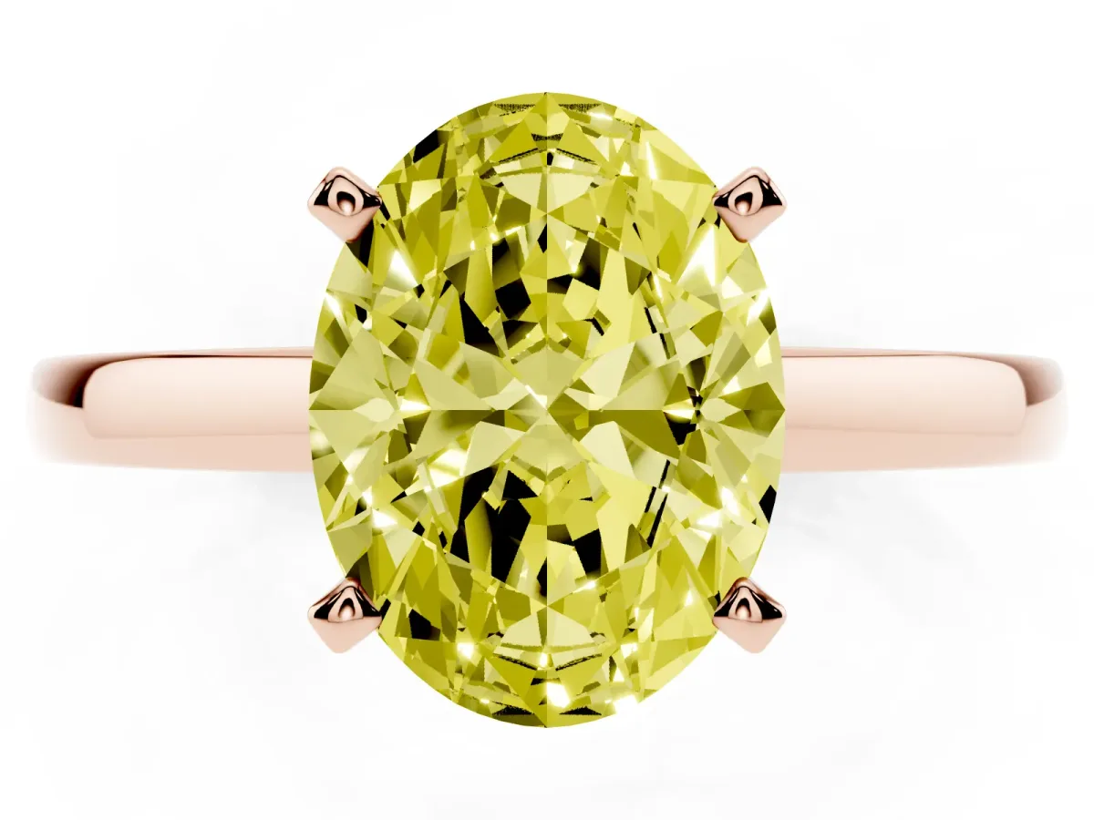 Fancy Yellow Oval Cut Solitaire Diamond Engagement Ring with Four-Prong Setting on a Classic Band Rose gold