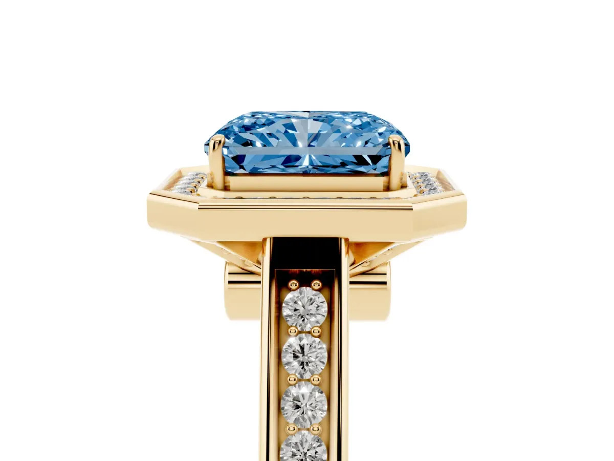 Fancy Blue Emerald Cut Halo Solitaire Diamond Ring with Pave Band and Bezel Setting Yellow gold