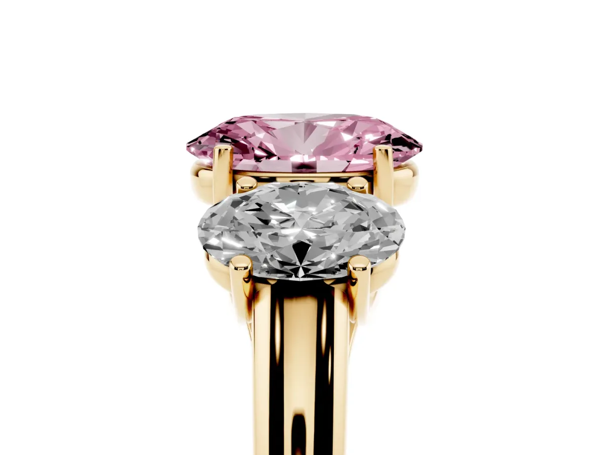 Fancy Pink Three-Stone Oval Cut Diamond Engagement Ring with Prong Setting Yellow gold
