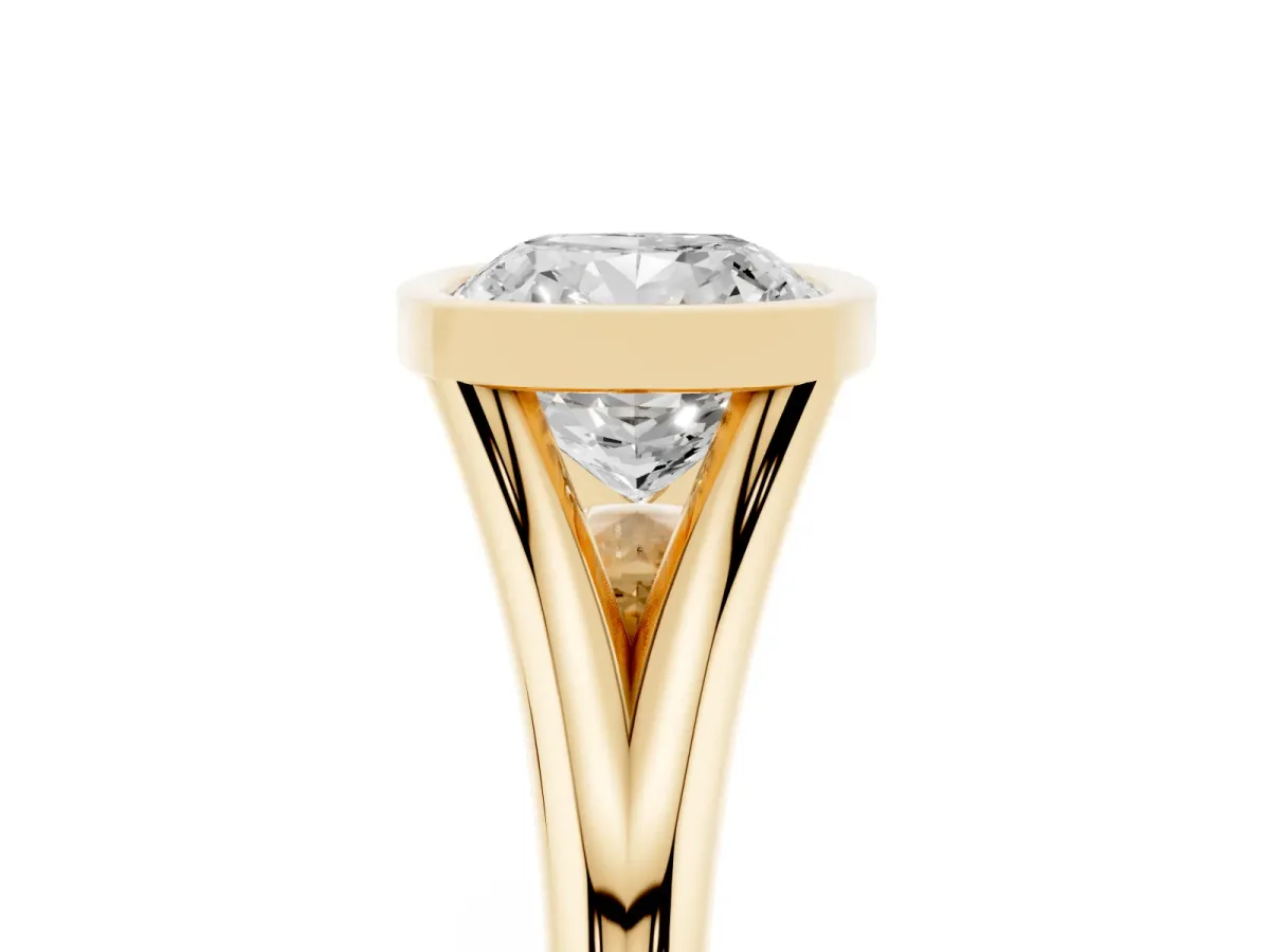 Bezel Set Cushion Cut Cut Solitaire Ring with Tapered Band Yellow gold