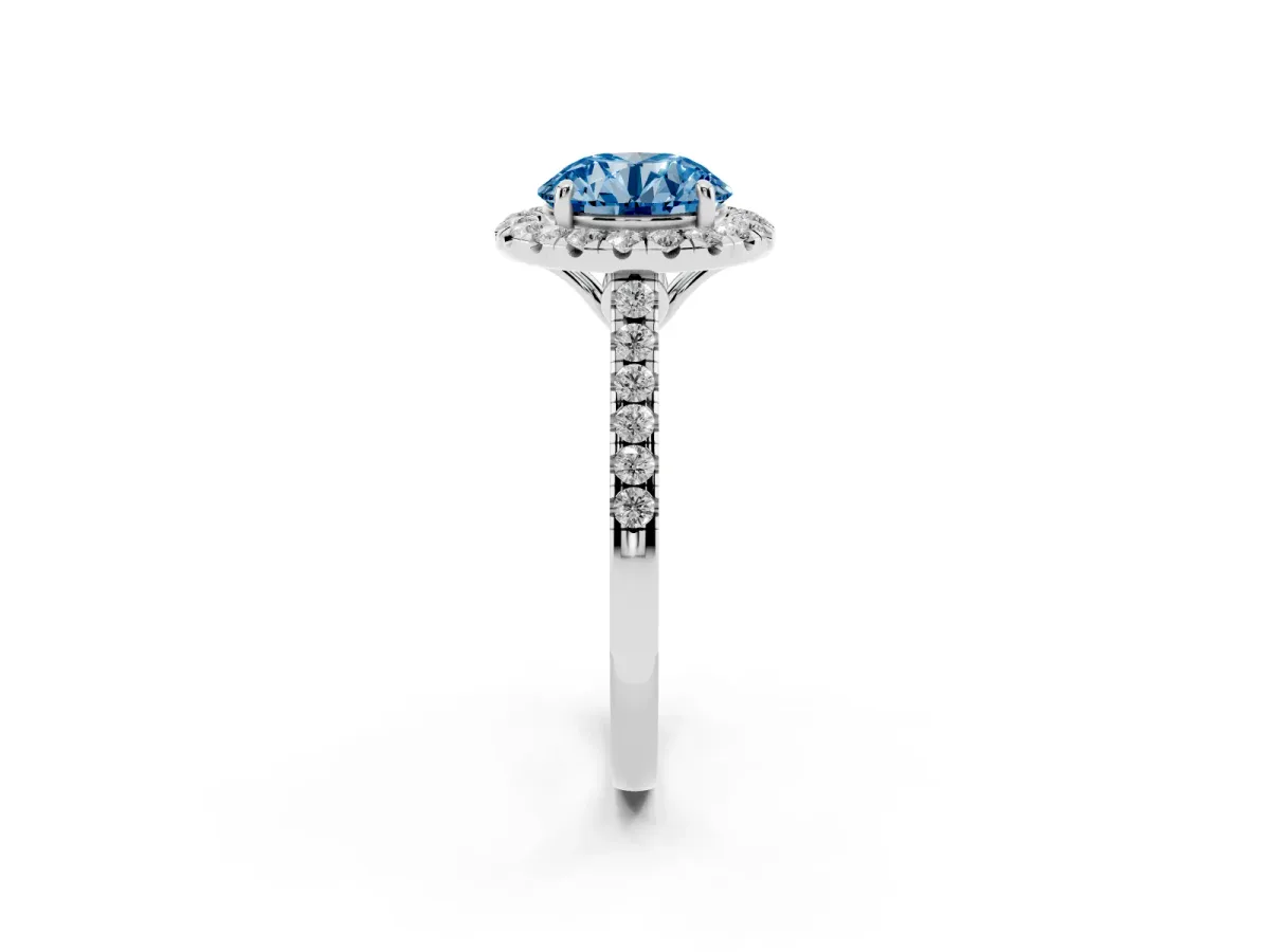 Fancy Blue Round Cut Halo Pavé Diamond Engagement Ring with Four-Prong Setting Silver