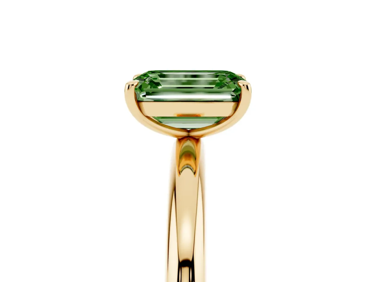 Fancy Green Emerald Cut Solitaire Diamond Ring with Four-Prong Setting on a Plain Band Yellow gold