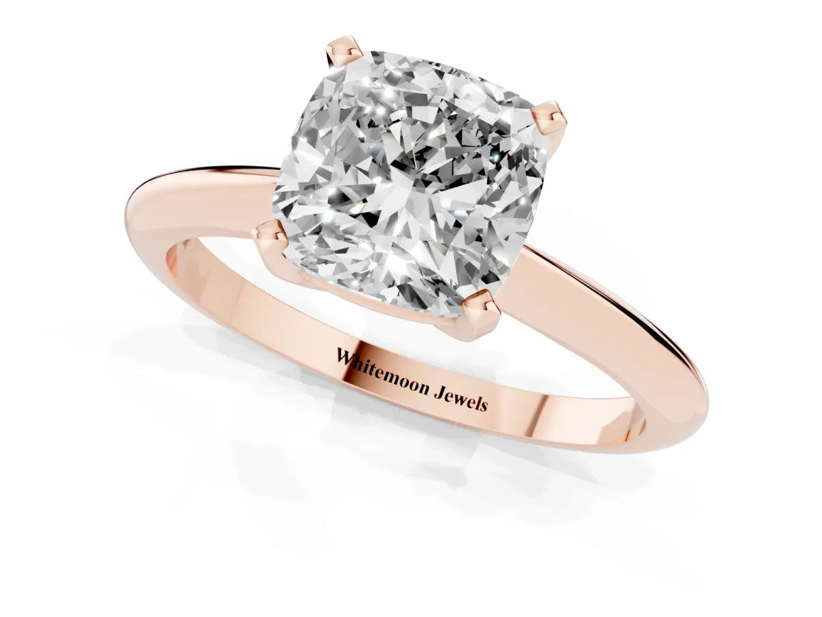 Cushion Cut Cut Solitaire Ring with Four-Prong Setting on a Classic Band Rose gold