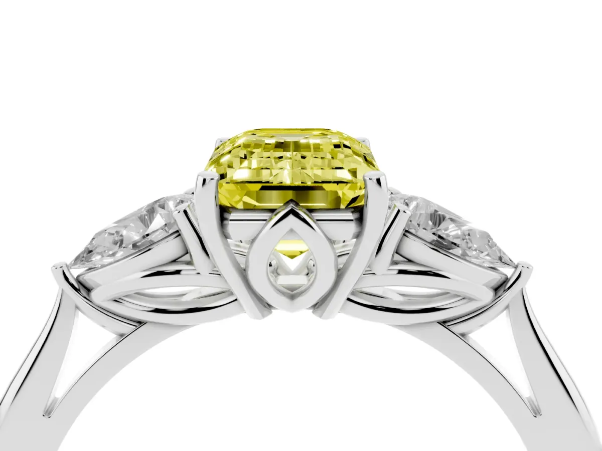 Fancy Yellow Three-Stone Emerald Cut Diamond Ring with Pear Side Stones in Four-Prong Setting Silver