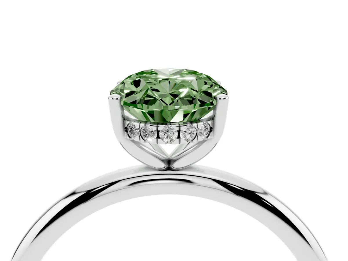 Fancy Green Oval Cut Cut Solitaire Engagement Ring with Four-Prong Setting and Classic Band Silver