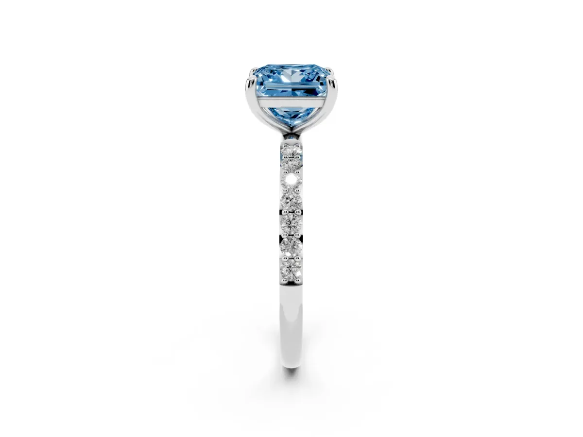 Fancy Blue Princess Cut Diamond Solitaire Ring with Round Pavé Band and Prong Setting Silver