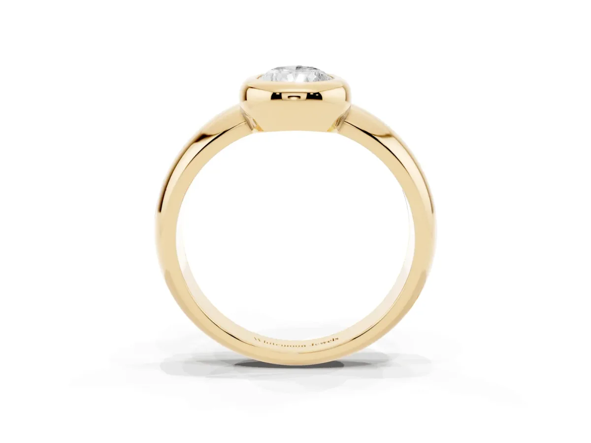 Bezel Set Pear Cut Solitaire Ring with Wide Band Yellow gold
