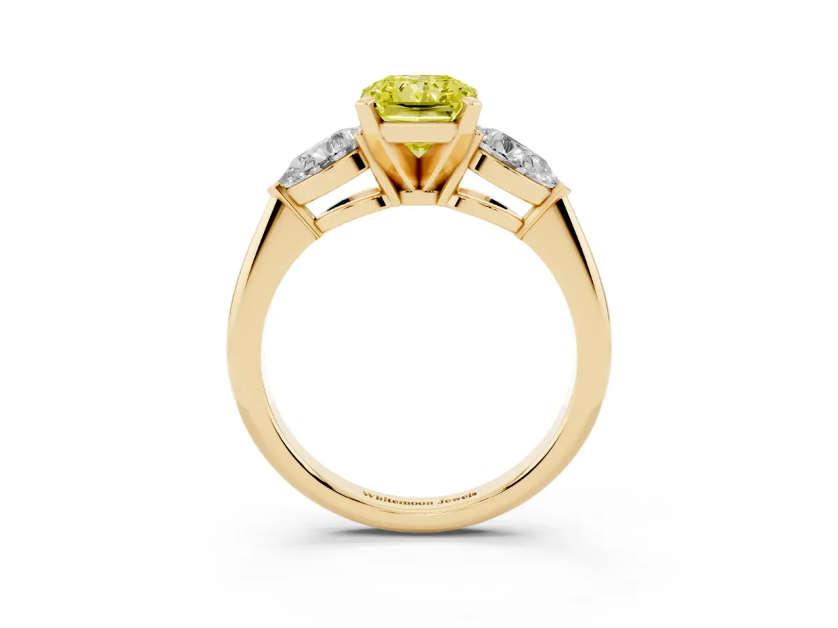 Fancy Yellow Three-Stone Radiant Cut Diamond Ring with Pear Side Stones and Four-Prong Setting Yellow gold