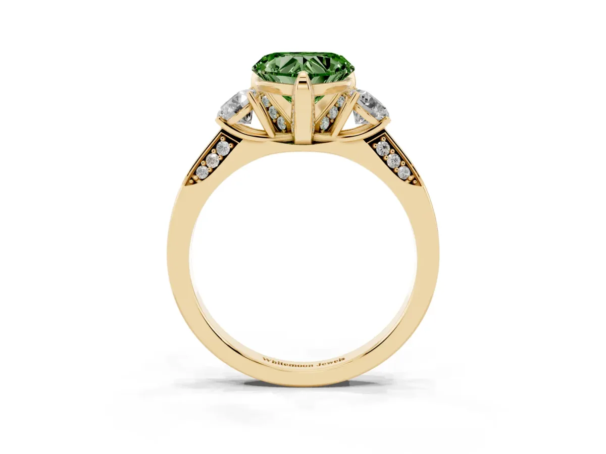 Fancy Green Heart Cut Brilliant Three-Stone Diamond Ring with Pavé Band and Four-Prong Setting Yellow gold