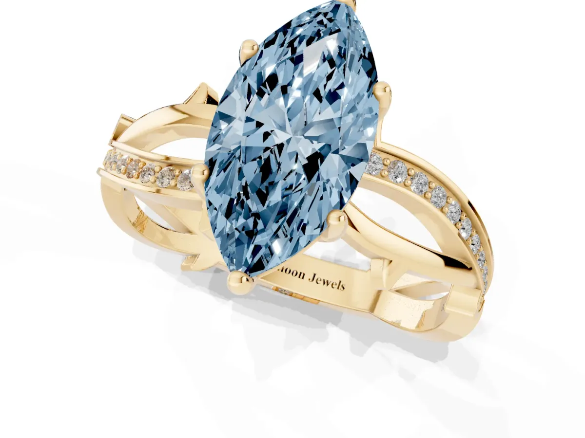 Fancy Blue Marquise Cut Solitaire Twist Band with Pavé Accents and Four-Prong Setting Yellow gold