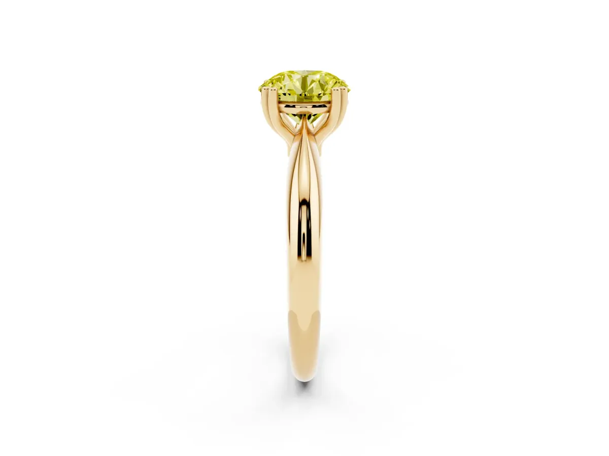 Fancy Yellow Round Cut Cut Solitaire Engagement Ring with Tapered Band and Four-Prong Setting Yellow gold