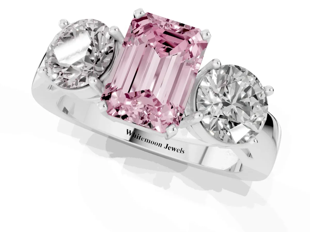 Fancy Pink Three-Stone Emerald Cut Diamond Ring with Round Side Stones, Classic Band, and Four-Prong Setting Silver