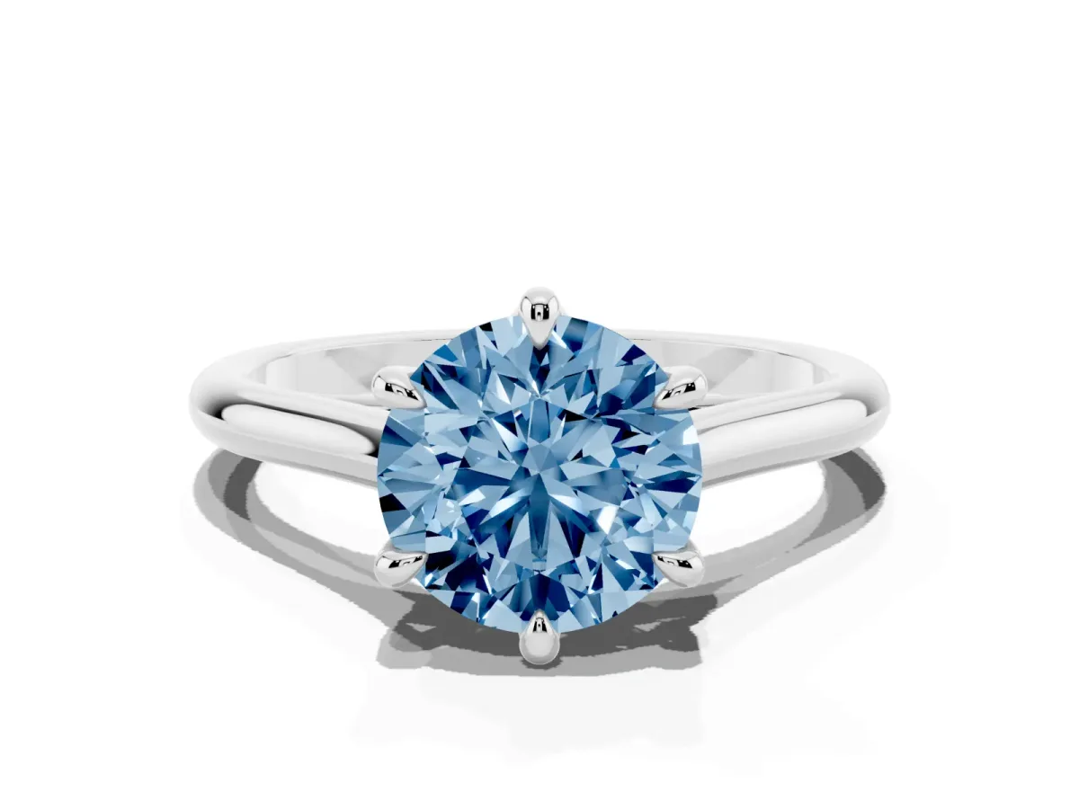 Fancy Blue Round Cut Solitaire Engagement Ring with Six-Prong Setting and Classic Band Silver